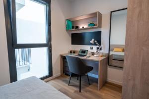 Posteľ alebo postele v izbe v ubytovaní Micampus Alicante Student Residence