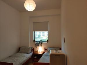 Кровать или кровати в номере DXB Backpackers