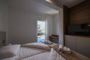 Postel nebo postele na pokoji v ubytování Resort Mirakul II. + 65 fotografií