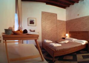 Postel nebo postele na pokoji v ubytování B&B Porto Trani