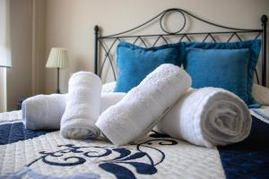 A bed or beds in a room at Casa Maia
