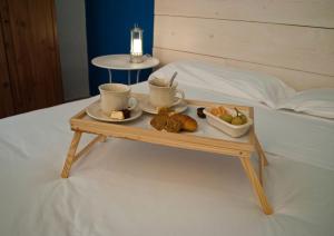 Postel nebo postele na pokoji v ubytování B&B Porto Trani