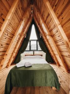 Cama o camas de una habitación en Gültepe Bungalov