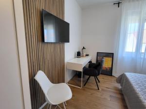 TV a/nebo společenská místnost v ubytování Central rooms