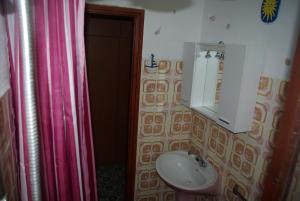 Koupelna v ubytování Rooms Tia + 37 fotografií