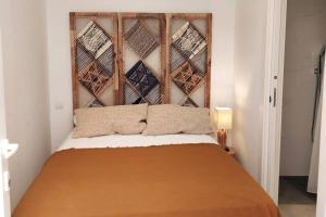 Posteľ alebo postele v izbe v ubytovaní Apartamento en Estepona playa
