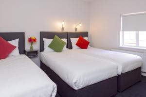 Postel nebo postele na pokoji v ubytování Dan Linehan's B&B