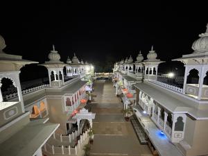 a view of a building at night at Hotel Gautam Lonavala in Lonavala