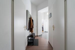 Televízia a/alebo spoločenská miestnosť v ubytovaní Yeshello Apartment Central Station