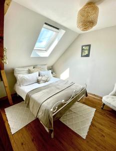 Ένα ή περισσότερα κρεβάτια σε δωμάτιο στο Maison Collinée