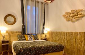 Cama ou camas em um quarto em SabiaNatura - boutiqueMadrid