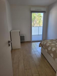 Posteľ alebo postele v izbe v ubytovaní Superbes appartements neufs à Montpellier