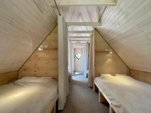 Katil atau katil-katil dalam bilik di Holiday homestead Camp of Forest Souls