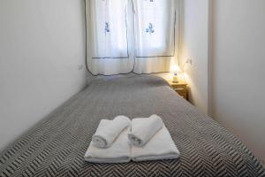Postel nebo postele na pokoji v ubytování Inftour Arenal Sol Apartamento + 22 fotografií