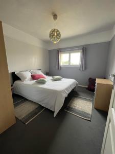 En eller flere senge i et værelse på Maison de campagne proche Libourne