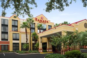 a rendering of the raniagara hotel at Ramada by Wyndham Suites Orlando Airport in Orlando