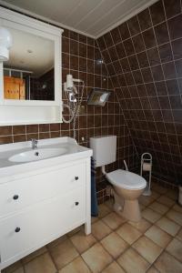 Koupelna v ubytování Ferienhaus Kiebitz mit Sauna