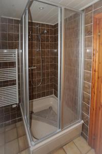 Koupelna v ubytování Ferienhaus Kiebitz mit Sauna
