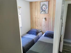 Posteľ alebo postele v izbe v ubytovaní Le Moulin de la Fortie, Gîtes