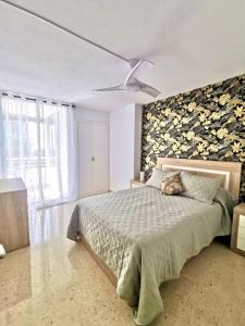 Postel nebo postele na pokoji v ubytování Apartamento Sol y Playa Coblanca 21
