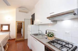 A kitchen or kitchenette at Topazio