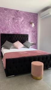 Łóżko lub łóżka w pokoju w obiekcie Hotel Boutique Andalucia