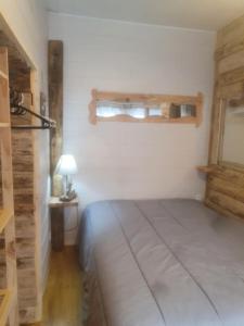 Posteľ alebo postele v izbe v ubytovaní bienvenue chez les choup;s le p;tit laponie