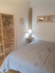 Posteľ alebo postele v izbe v ubytovaní bienvenue chez les choup;s le p;tit laponie + 5 fotografií