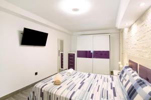 Posteľ alebo postele v izbe v ubytovaní Apartamento La Burrita