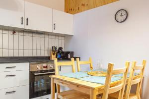 Kuchyň nebo kuchyňský kout v ubytování ALTEA Art apartments + 9 fotografií