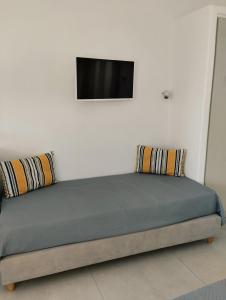 Postel nebo postele na pokoji v ubytování Allegro suite + 6 fotografií