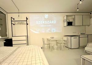 Kuchyň nebo kuchyňský kout v ubytování 2D Apartment