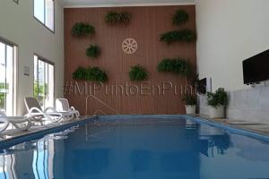 Piscine de l'établissement Precioso Apto con excelentes servicios incluidos ou située à proximité