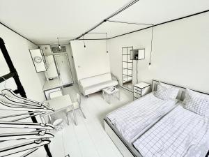 Postel nebo postele na pokoji v ubytování 2D Apartment