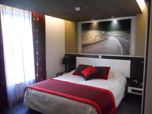 Łóżko lub łóżka w pokoju w obiekcie AppartHotel Belle Vue