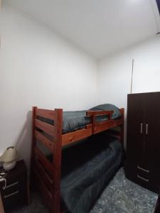 a bedroom with two bunk beds in a room at departamento guemes A in San Pedro