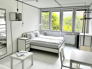 Postel nebo postele na pokoji v ubytování 2D Apartment