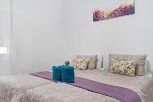 Posteľ alebo postele v izbe v ubytovaní Un descanso 2