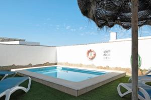 Bazén v ubytovaní Casa Josisa - Solo Familias alebo v jeho blízkosti