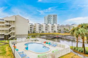an image of a pool at a resort at Baywatch F9 in Pensacola Beach