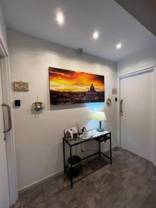Telewizja i/lub zestaw kina domowego w obiekcie Roma Vatican's Room