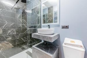 Kúpeľňa v ubytovaní Boutique Suites