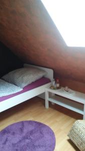 Postel nebo postele na pokoji v ubytování Ferienwohnung Hoppe 2