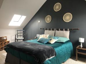 Postel nebo postele na pokoji v ubytování Le gîte de l Abreuvoir