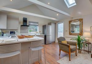 a kitchen with a sink and a counter top at The Garden Cottage in Nutley