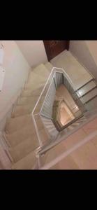 a stairway with a glass case on top of it at acogedor y céntrico apartamento in Alicante