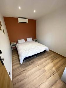 Een bed of bedden in een kamer bij Bastide Marseillaise