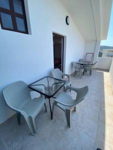 Balkón nebo terasa v ubytování Guest House in Utjeha