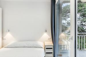 Posteľ alebo postele v izbe v ubytovaní Apt Pedrera 2 dormitorios