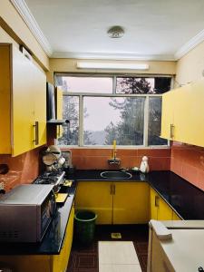 Kjøkken eller kjøkkenkrok på Hidden Heaven Cottage